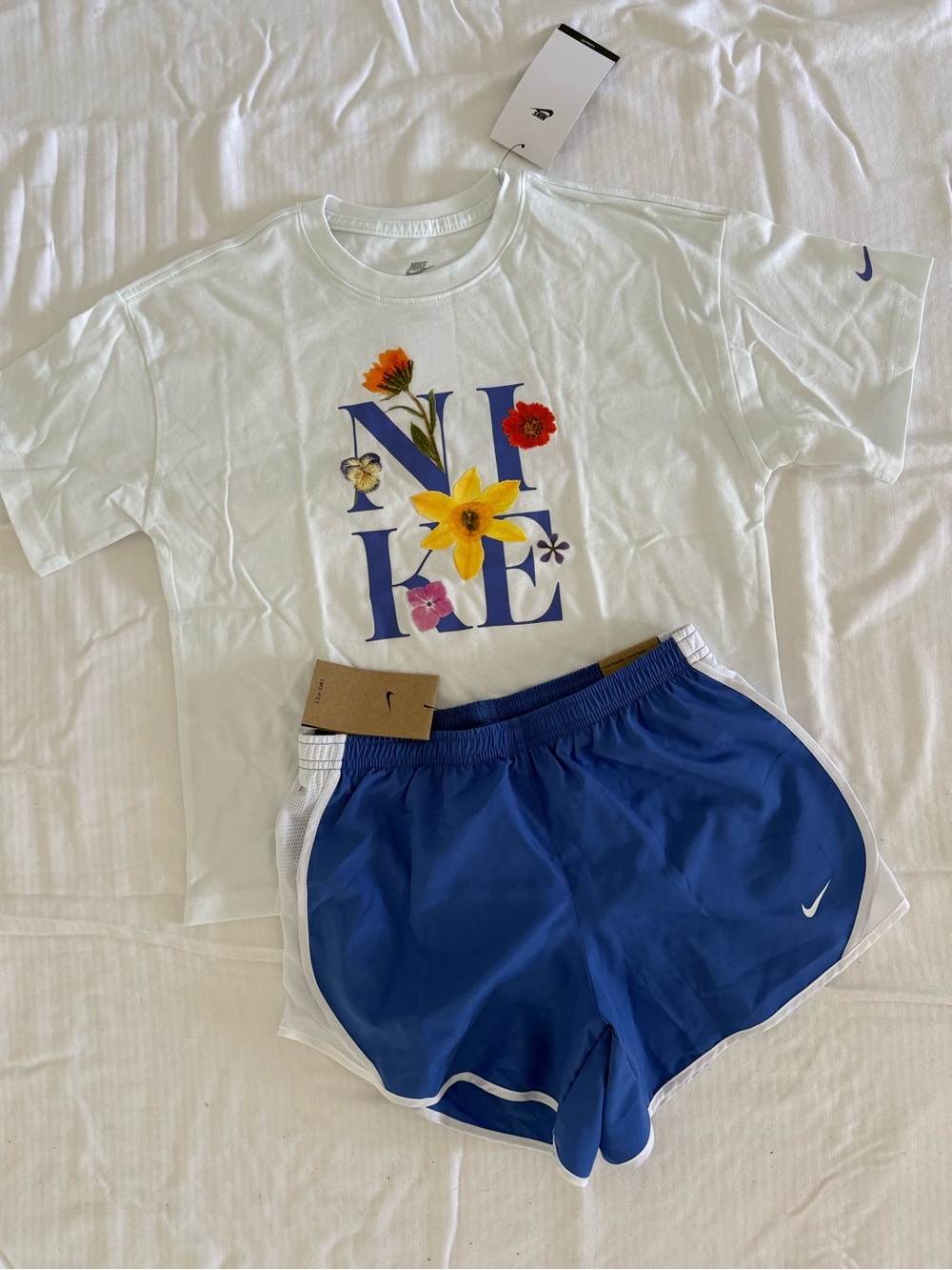 New girls Nike Sz L 12-14 White Graphic and Blue Running Shorts